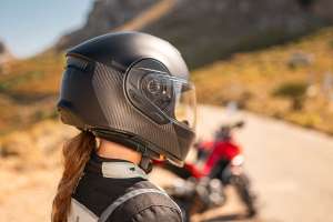 Cardo Beyond motorcycle helmet with integrated Bluetooth communications